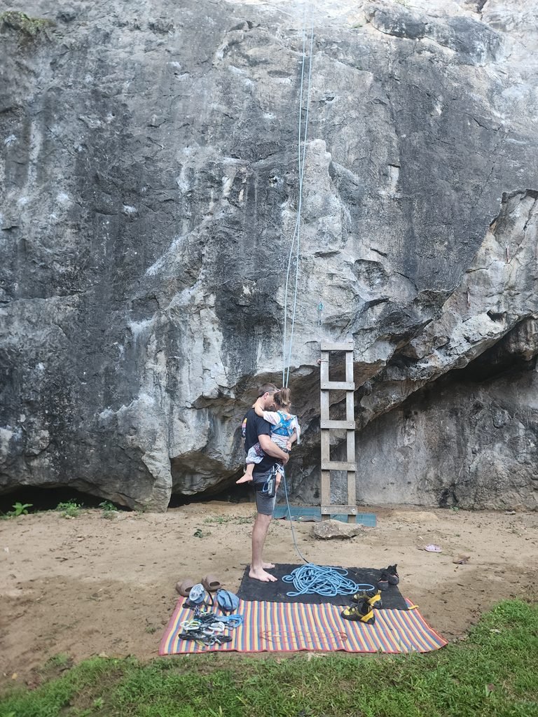 father and daughter rock climbing in Thailand